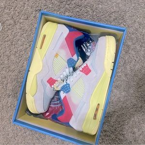 Size 11 Jordan 4 Guava ice.